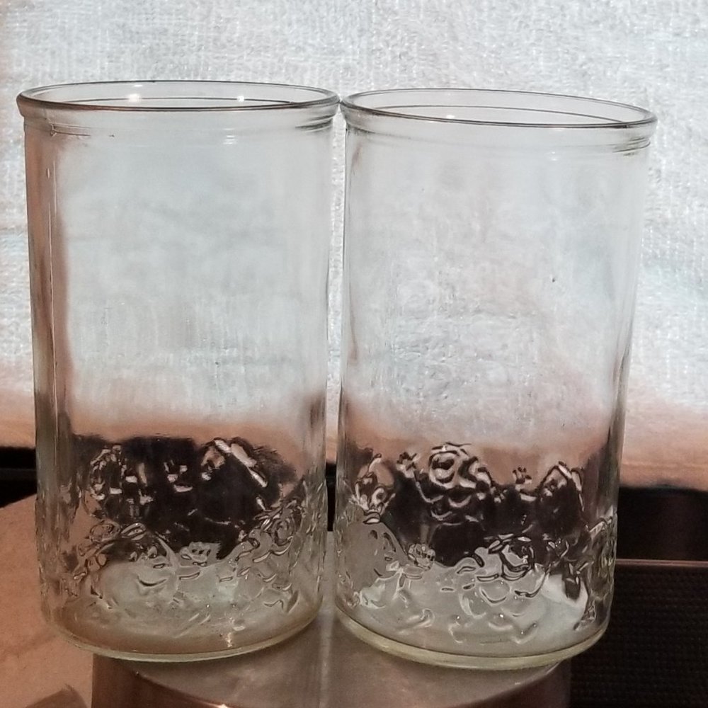 Smuckers set of 2 vintage jelly jars - raised fruit design drinking glasses